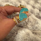 Unbounded turquoise ring