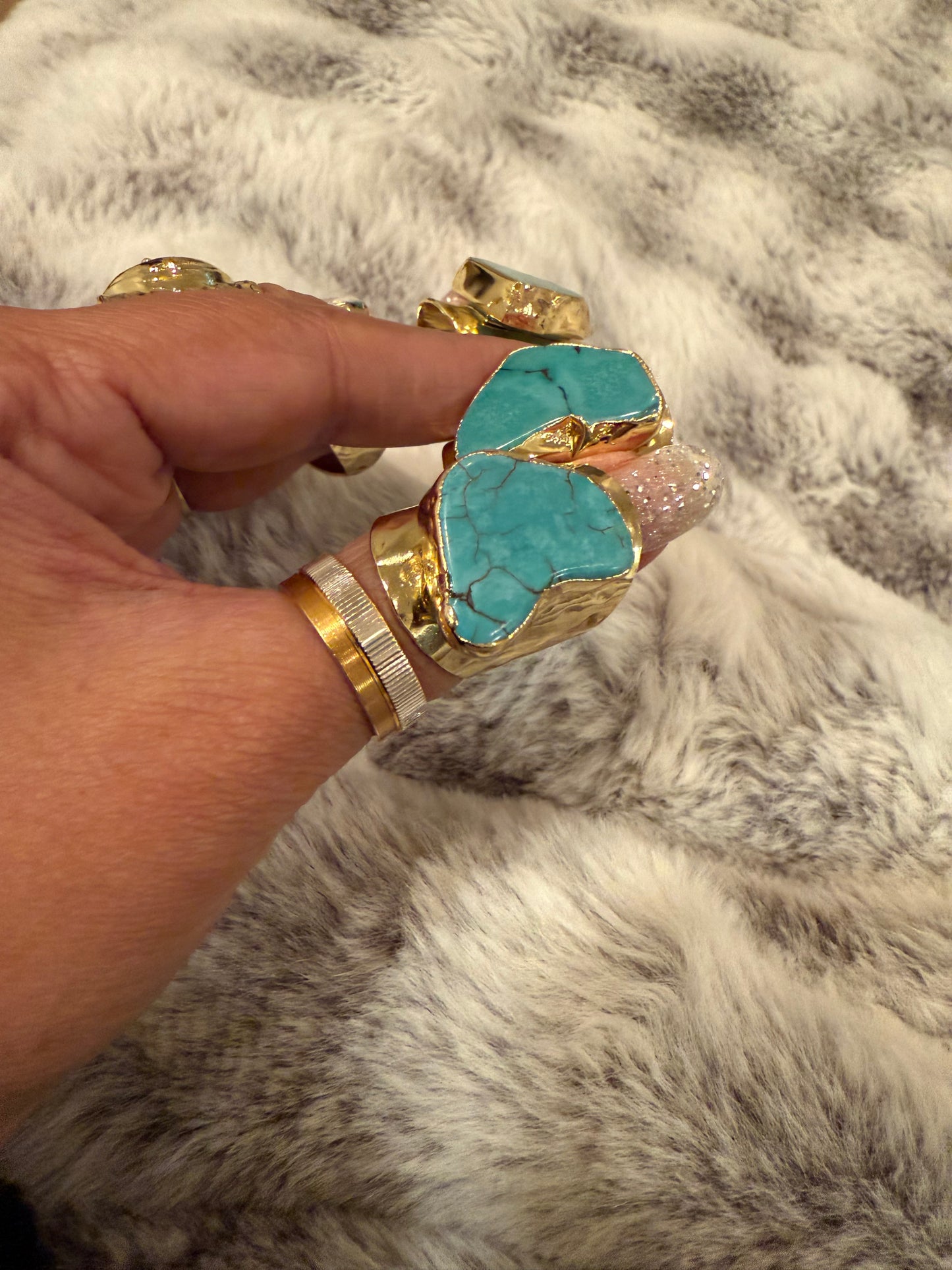 Unbounded turquoise ring