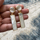 Shell and white crystal dangle earrings