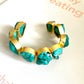 The “imperfectly perfect” Turquoise adjustable cuffs.