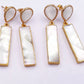Shell and white crystal dangle earrings